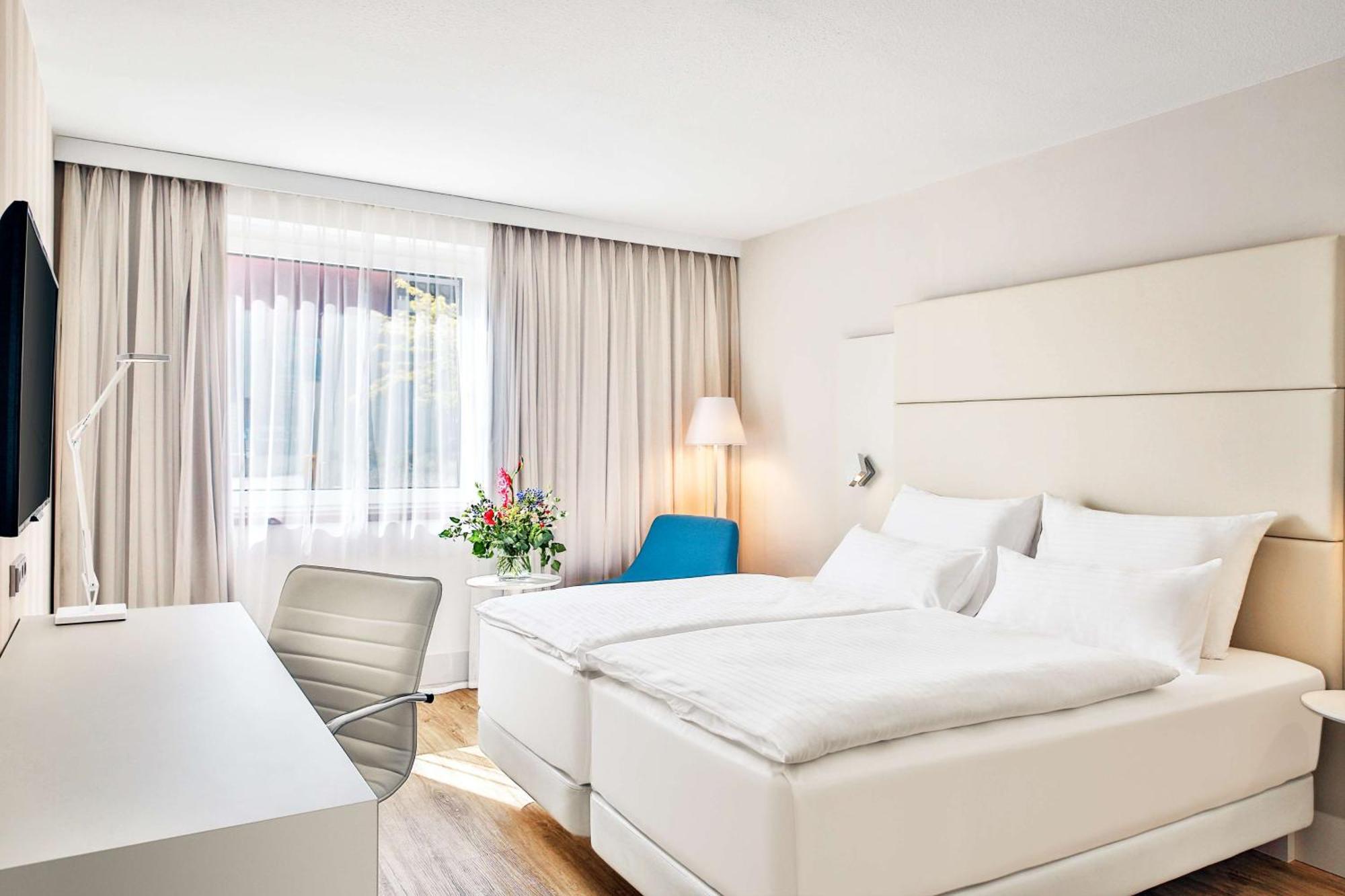 فندق إن إتش فيينا إيربورت كونفرانس سنتر سخويشات المظهر الخارجي الصورة Room at the hotel